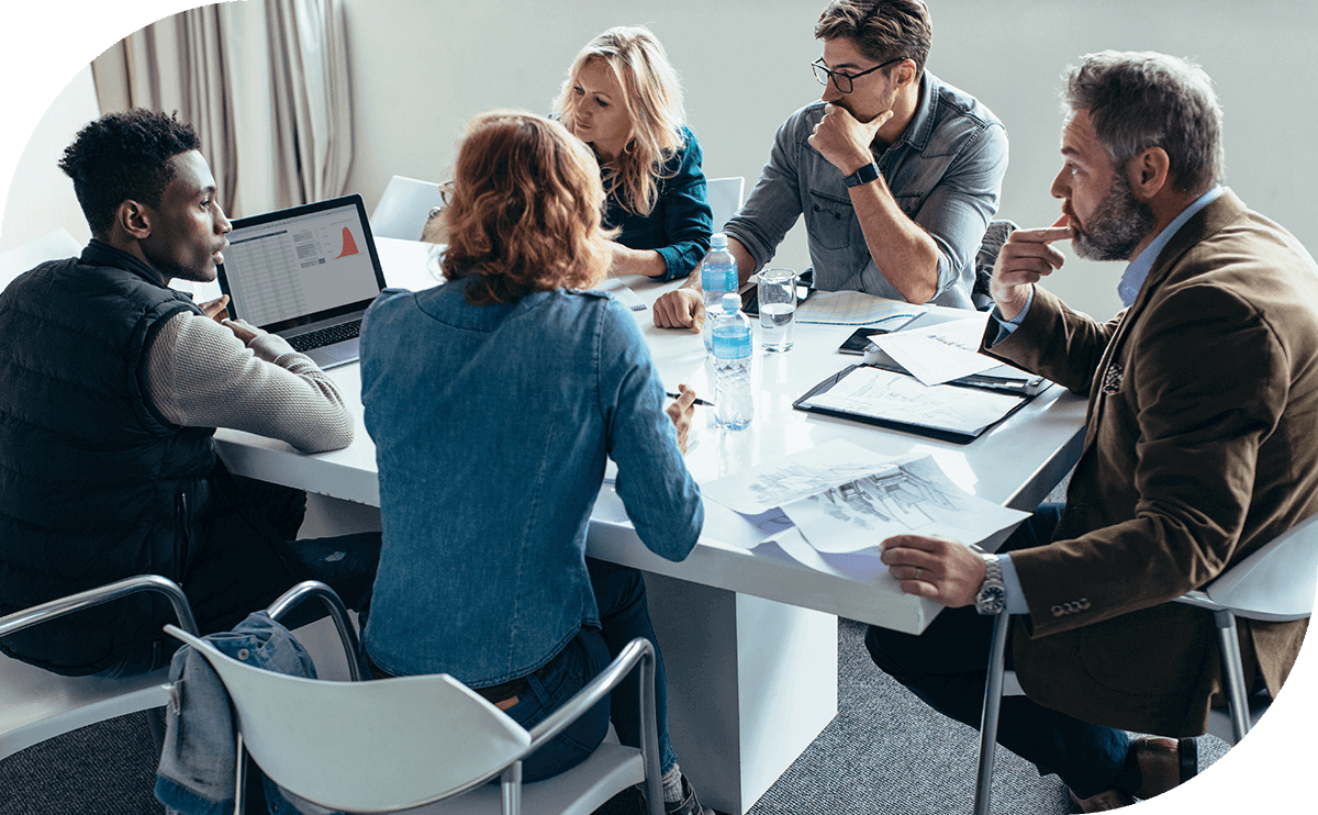 Consultant guiding a small business owner through compliance planning